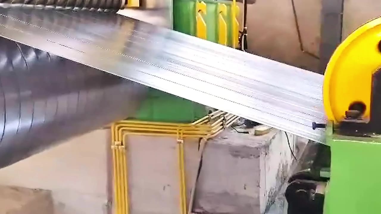 Slit strip running to the recoiler